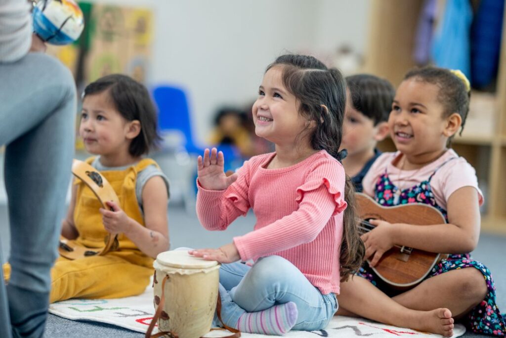 kids sitting in a music class