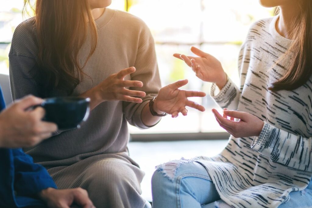 Friends talking over coffee